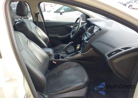 2012 Ford Focus Titanium z USA, uszkodzony, nr VIN 1FAHP3J2XCL346937